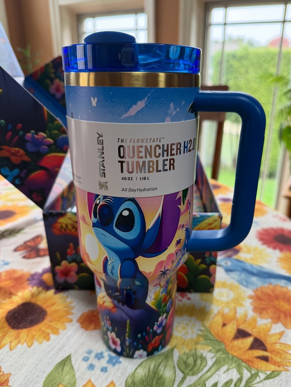 Stanley Blue Multi-Color Stitch Quencher H2.0 Tumbler with Gold Band